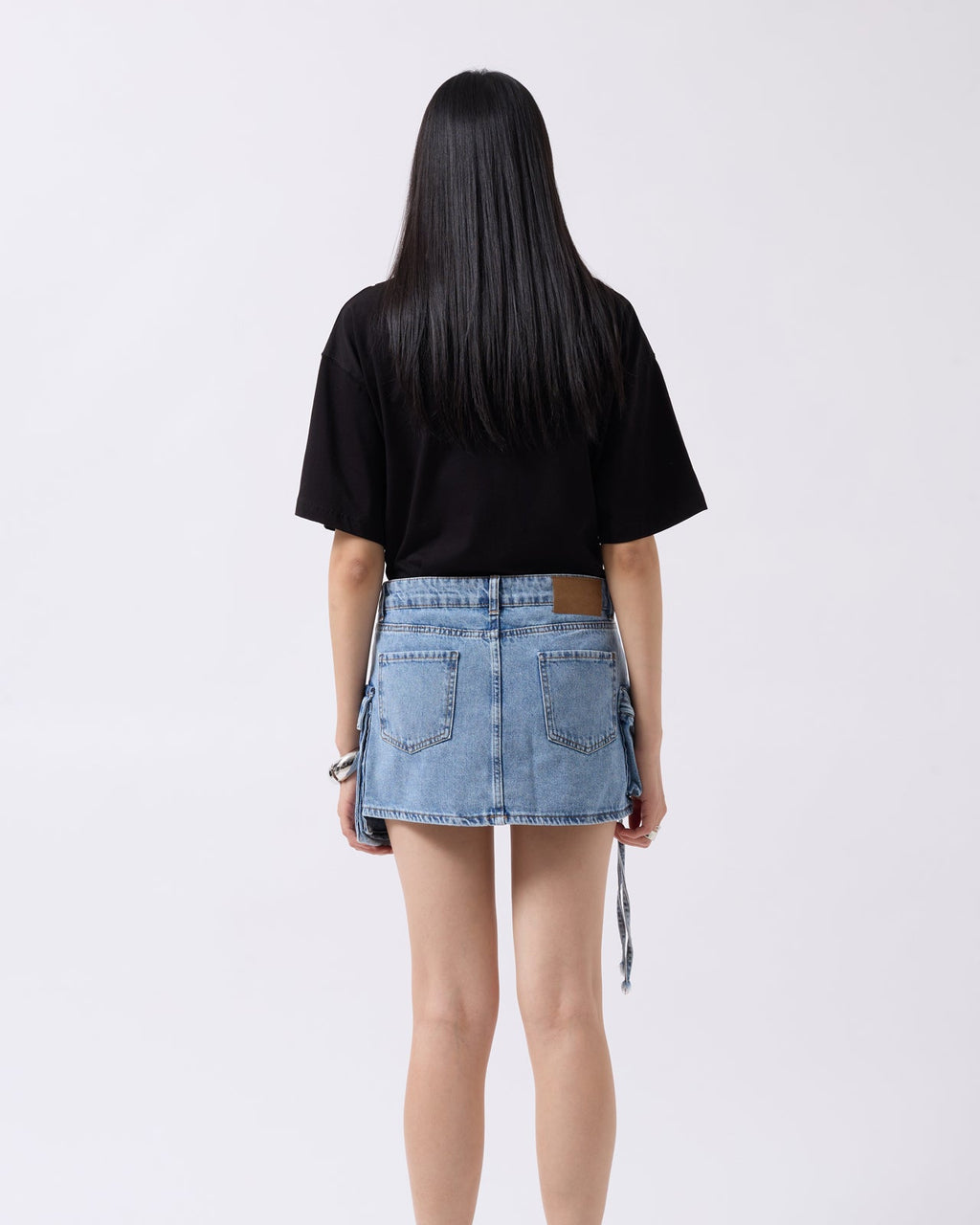 Blue denim mini skirt with cargo pockets