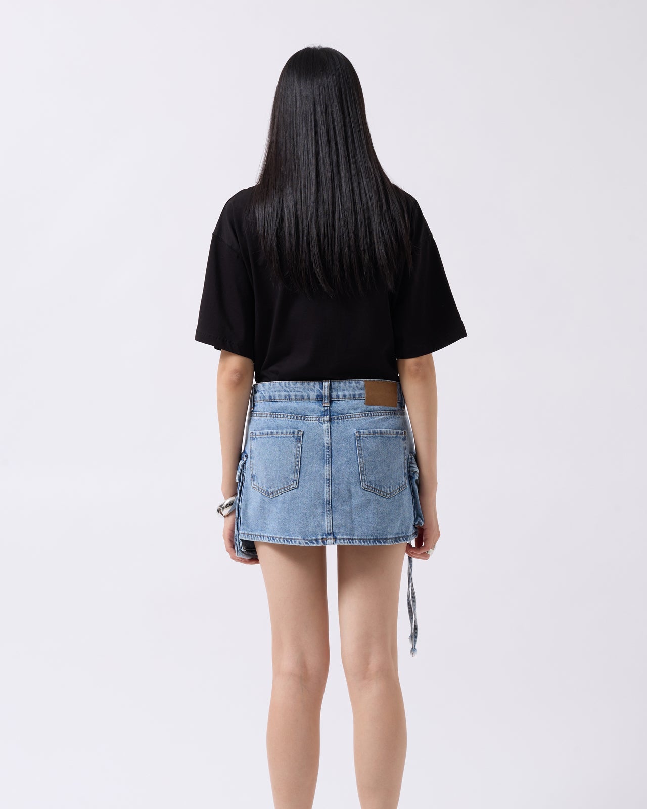 Blue denim mini skirt with cargo pockets